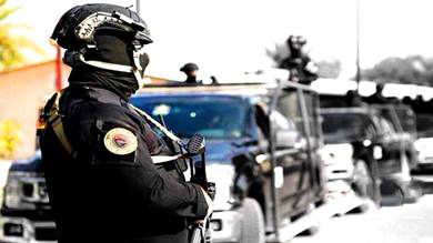 الأمن العراقي يعلن "الإطاحة بأحد أكبر مهربي العملة"